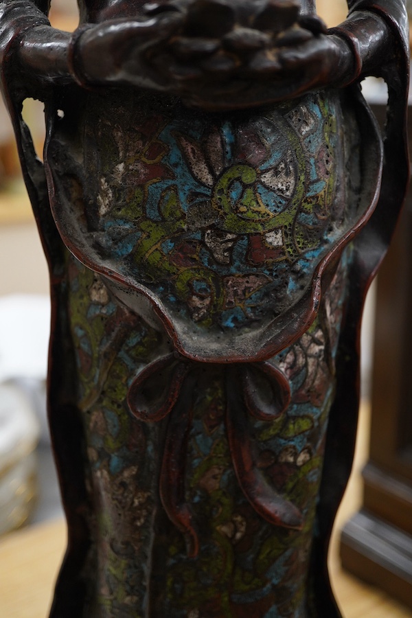 A large Chinese bronze and champleve enamel figure of a Bodhisattva, archaic style seal mark to base, 66cm